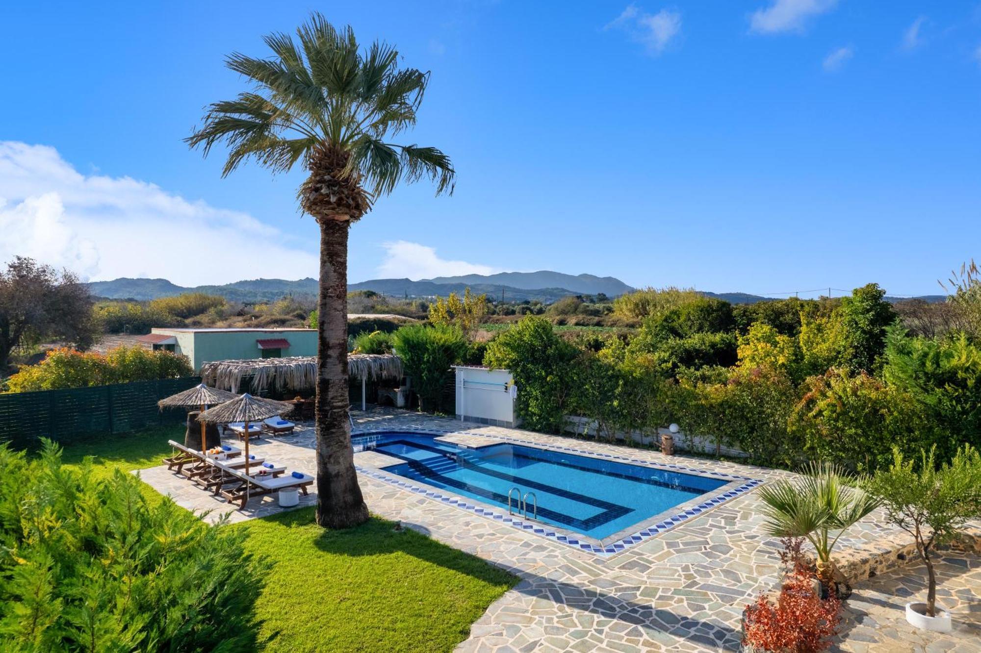 Villa Palmeras Soroni Ngoại thất bức ảnh